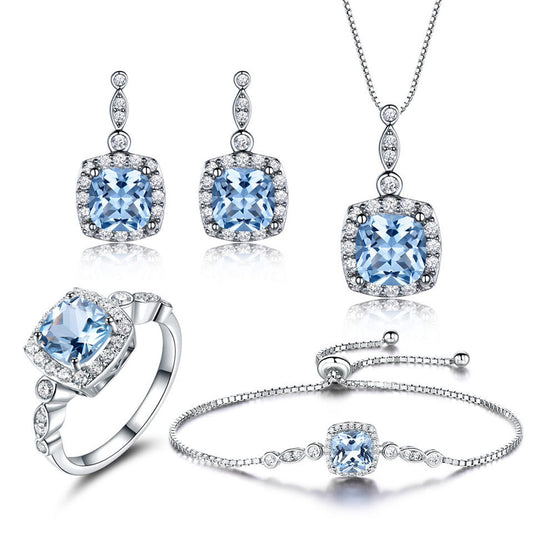 Elegant 925 Sterling Silver Sky Blue Topaz Four-Piece Jewelry Set