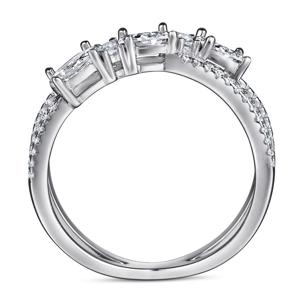 Rotating Cross Zircon Engagement Ring