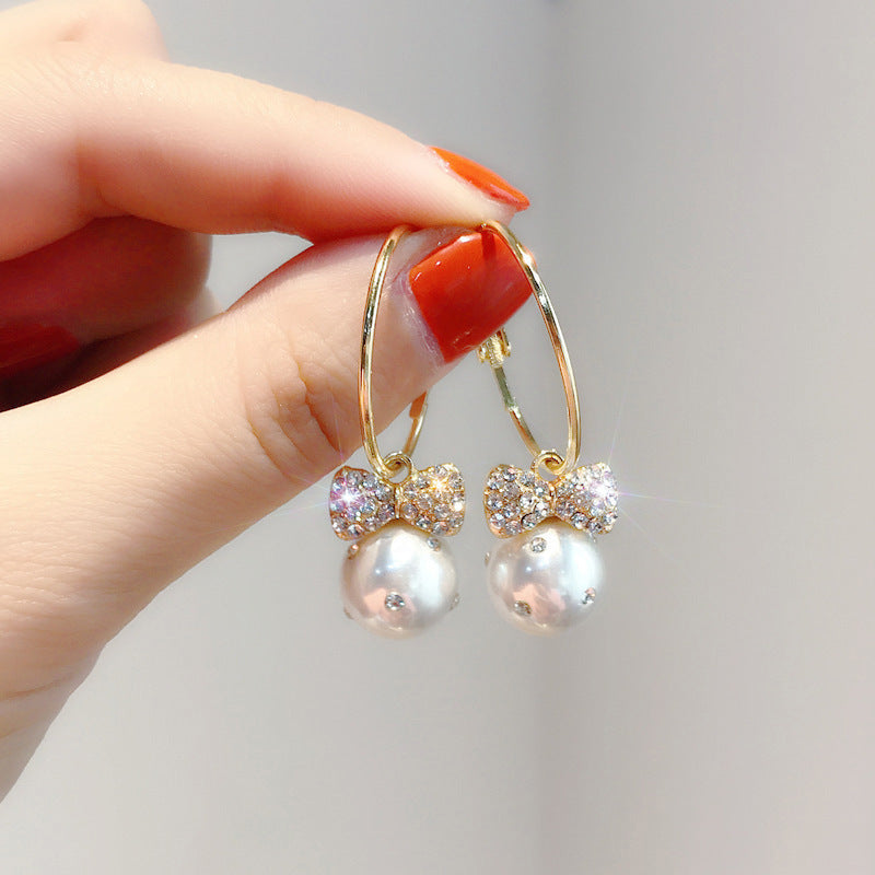 Elegant Pearl Bow Earrings