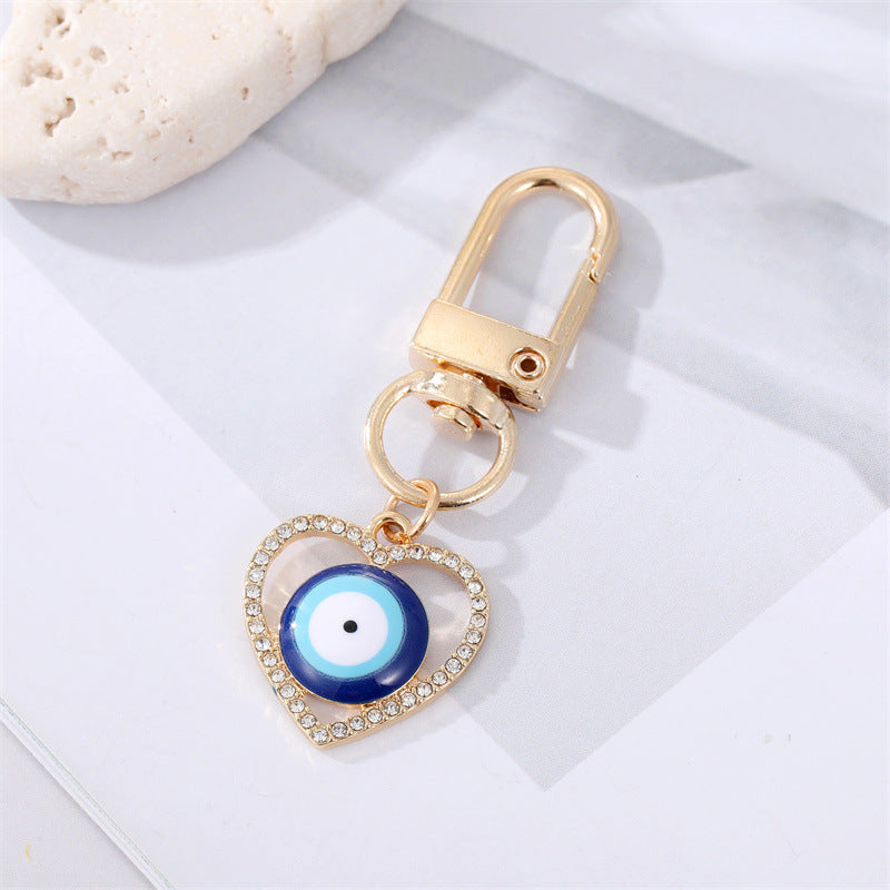 Dot Drilling Alloy Love Eye Keychain