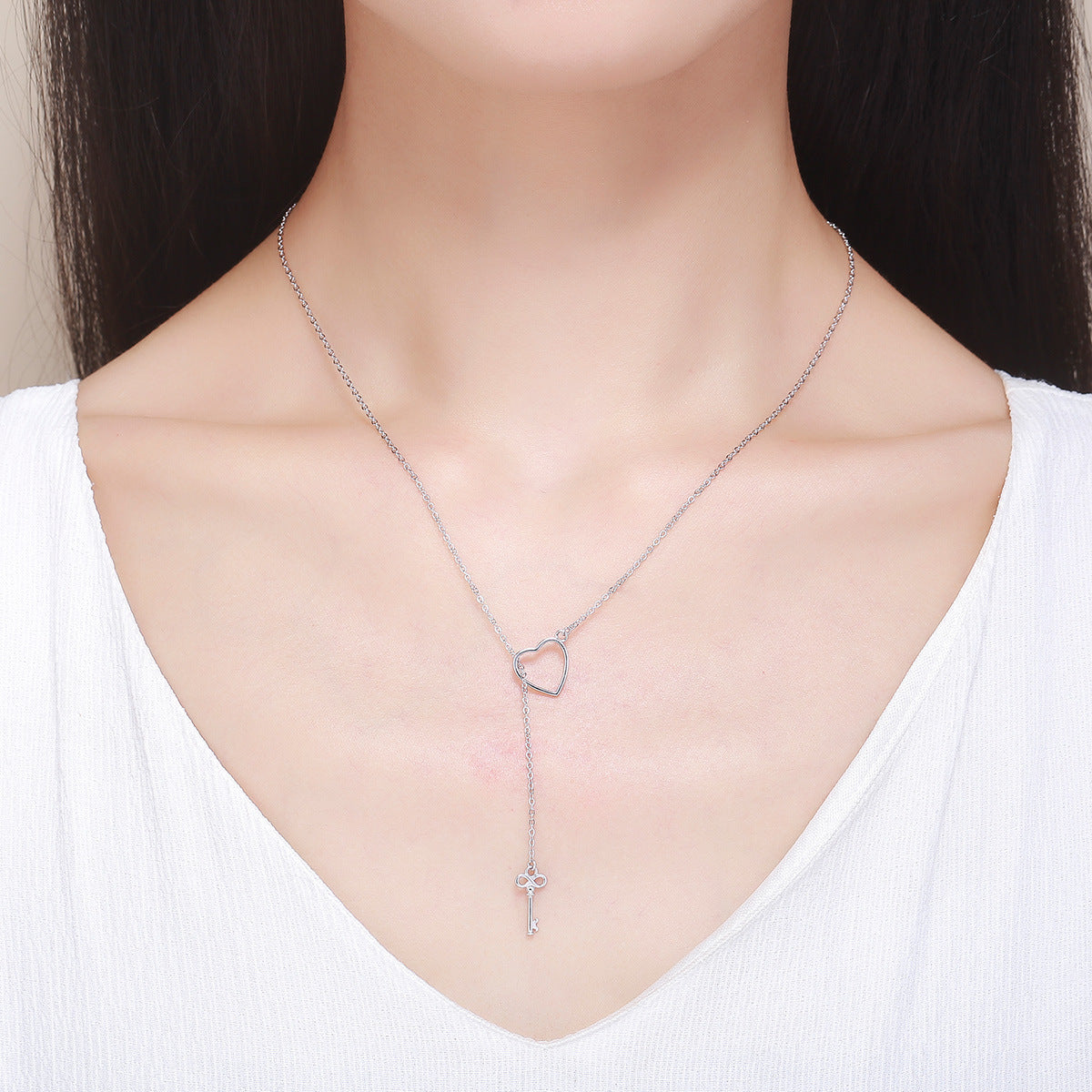 Female heart-shaped sterling silver necklace