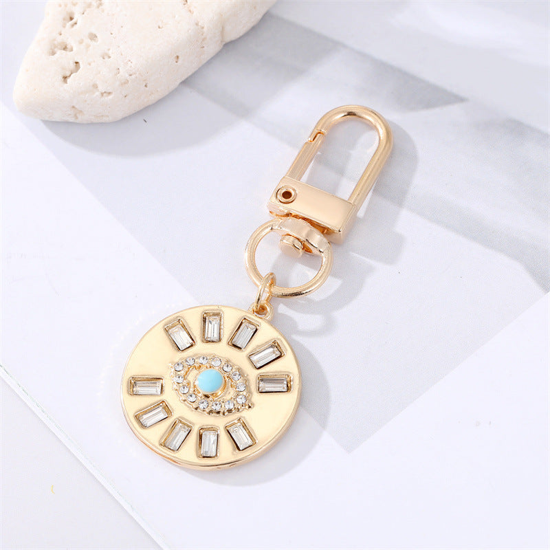 Dot Drilling Alloy Love Eye Keychain