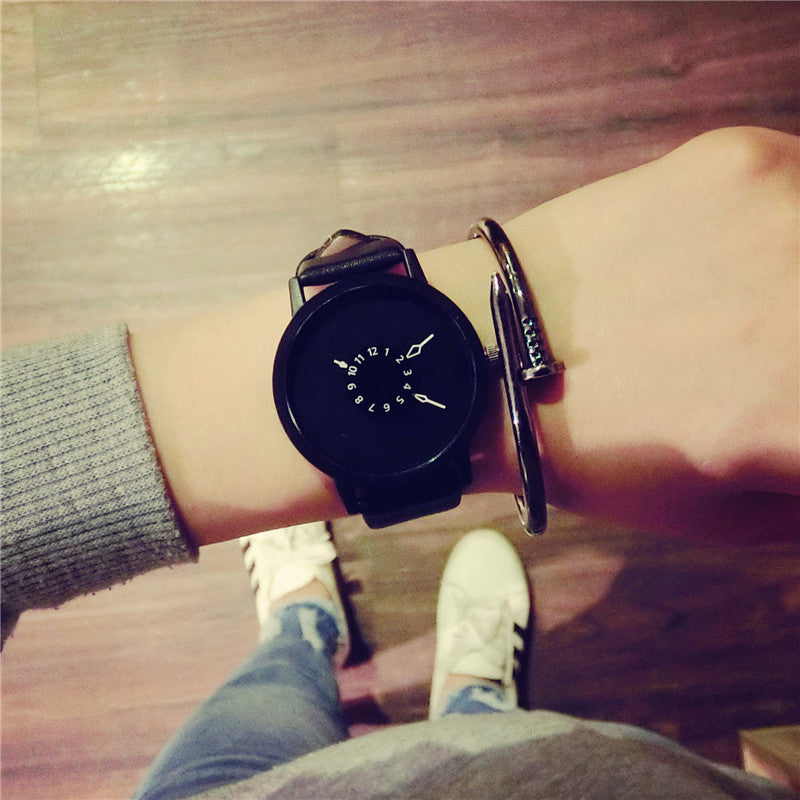 Korean version Watch female fashion student new turntable personality creative belt lovers black and white a simple quartz watch