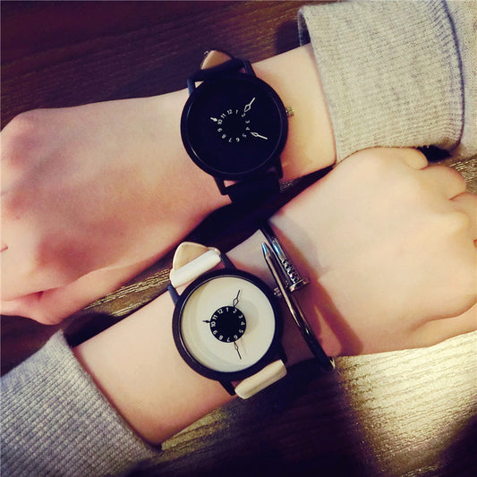 Korean version Watch female fashion student new turntable personality creative belt lovers black and white a simple quartz watch