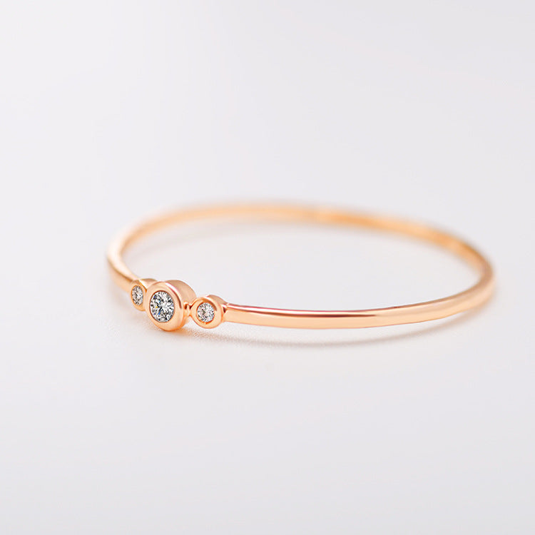 Three diamond copper zircon joint rings