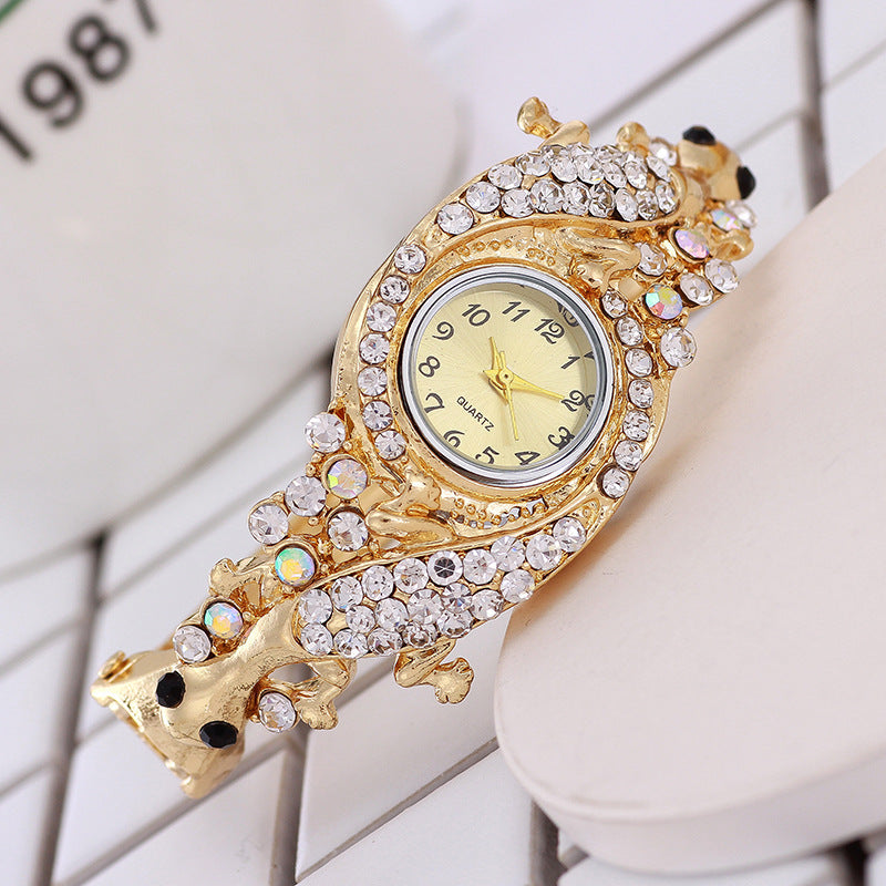 Diamond and gold bracelet watch