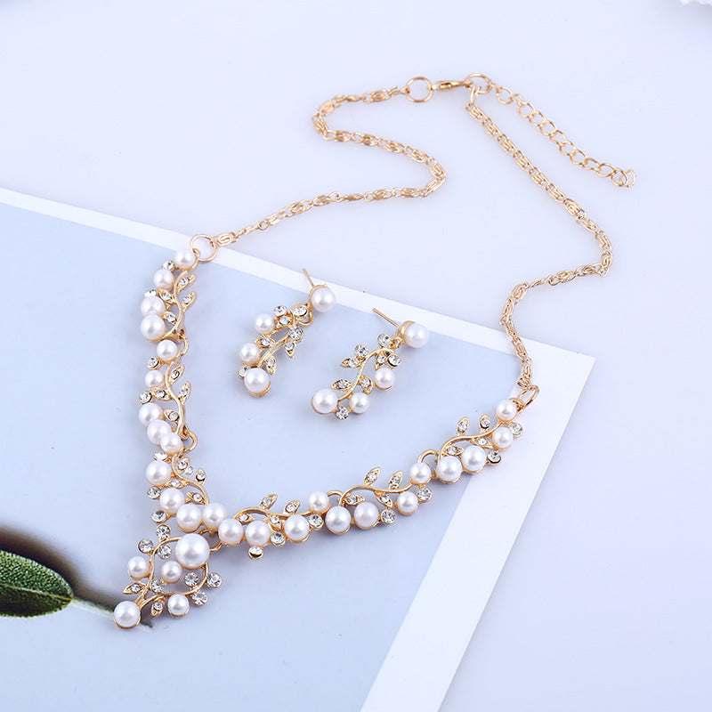 Aliexpress explosion of European and American fashion chain set sweet temperament all-match pearl diamond earrings necklace bride suit