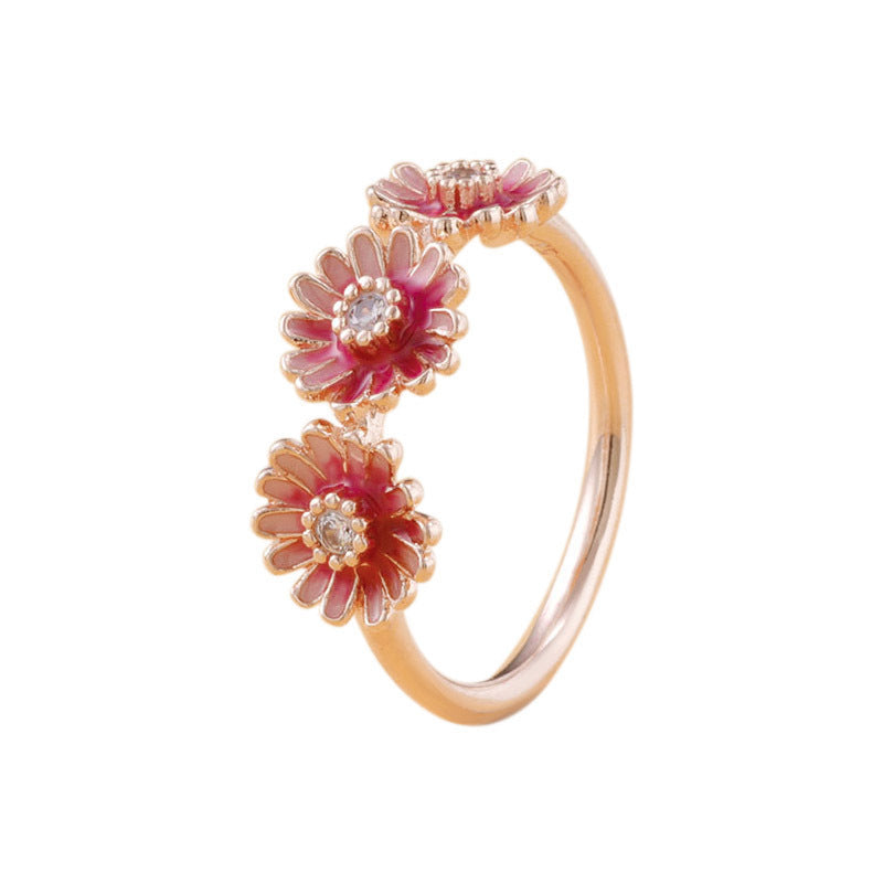 Three pink daisy rings