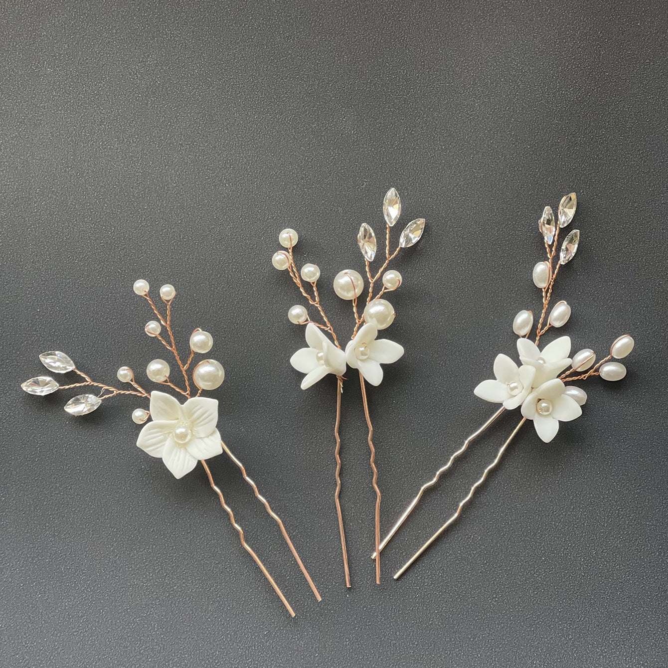 Three Sets Of White Flower U Shaped Hairpins